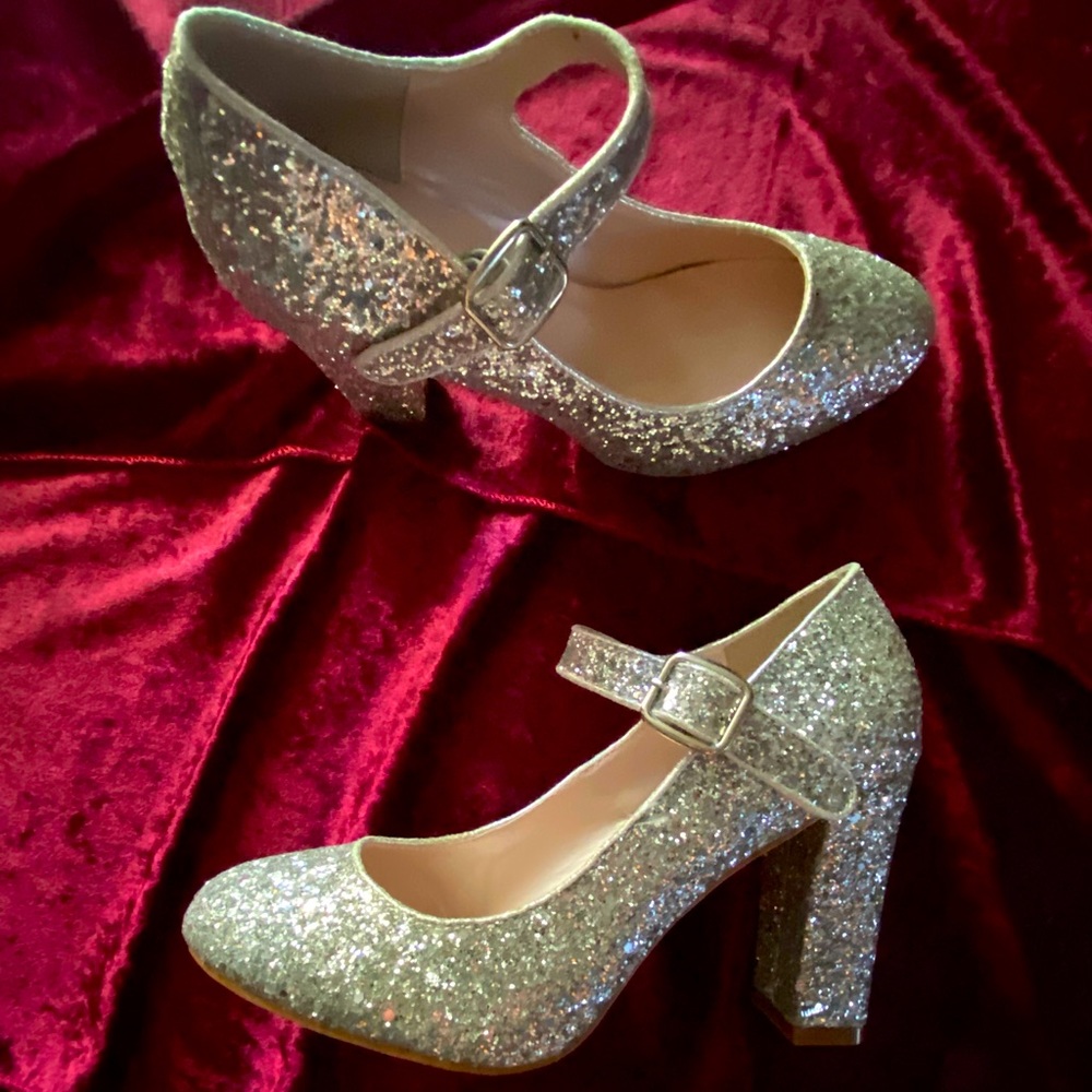 Brand new, size 8, never worn Fabulicious silver glitter heels
